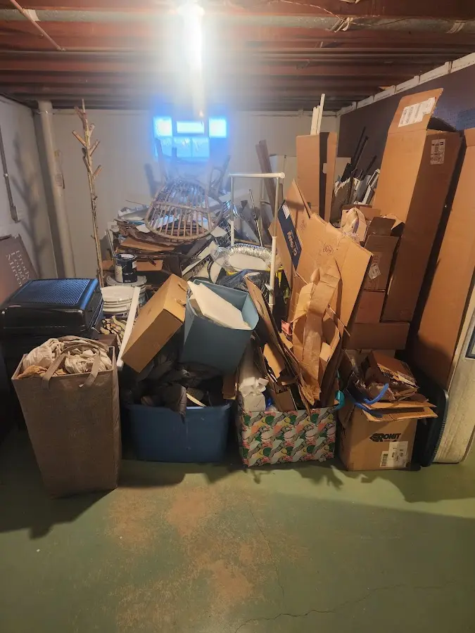 Roll-off dumpster container at job site for 4 Yard Dumpster Rental in Rogers